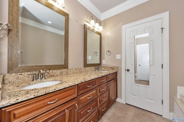 22656 Riviera Dr, Athens, AL 35613 - full bathroom featuring crown molding, double vanity, tile patterned floors, and baseboards
