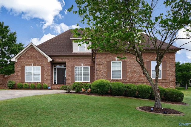 22656 Riviera Dr, Athens, AL 35613 - view of front facade with a front yard, brick siding, and a shingled roof