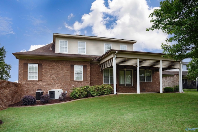 22656 Riviera Dr, Athens, AL 35613 - back of house with brick siding and cooling unit