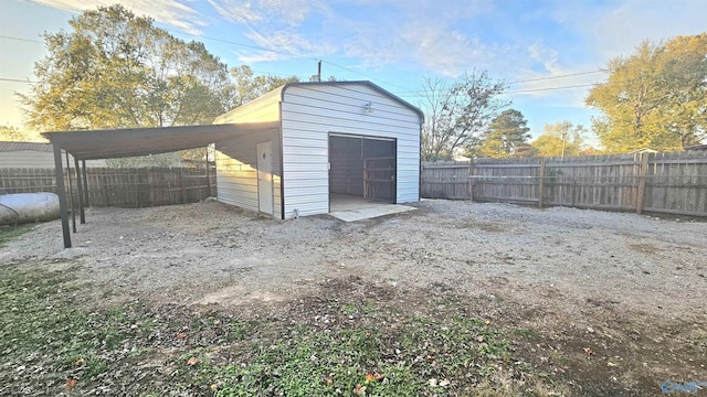 garage featuring a carport