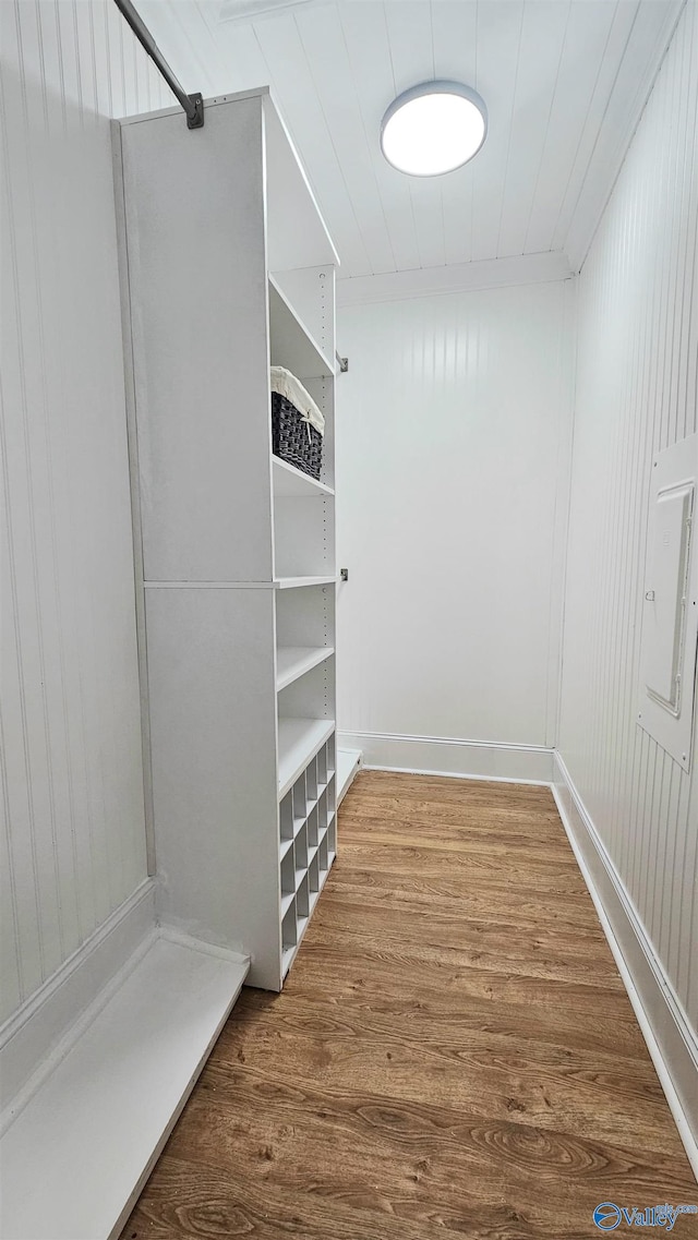 spacious closet featuring hardwood / wood-style floors