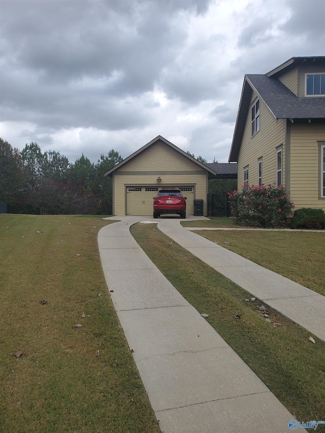 view of home's exterior with a lawn and a garage