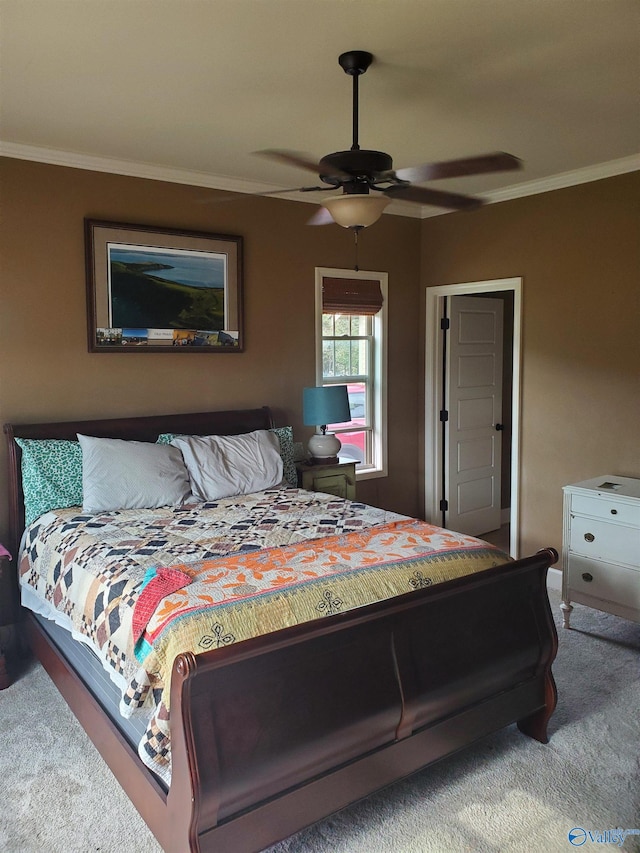 bedroom featuring ceiling fan, carpet floors, and crown molding