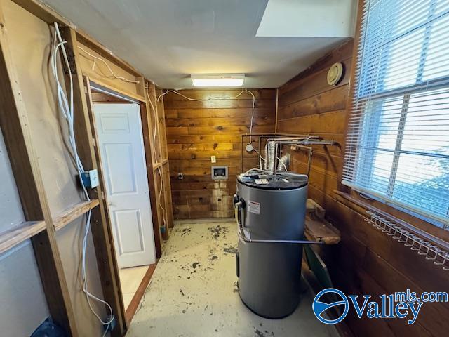 utility room with water heater