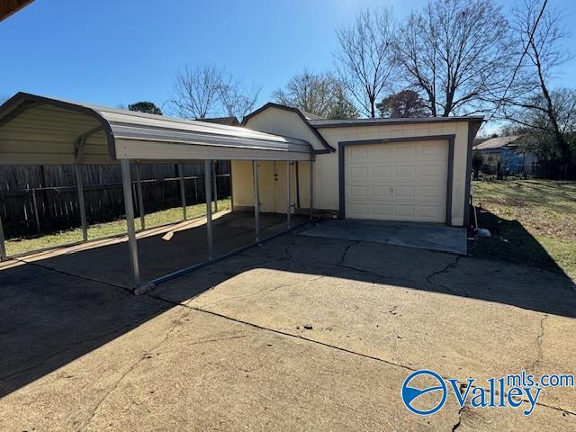 view of front of house with a carport