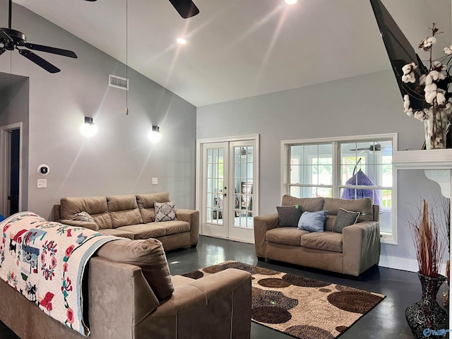 living room featuring ceiling fan, french doors, and high vaulted ceiling