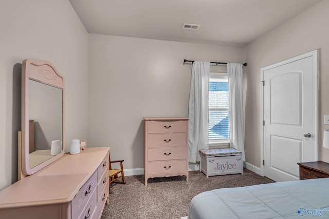 bedroom with dark carpet