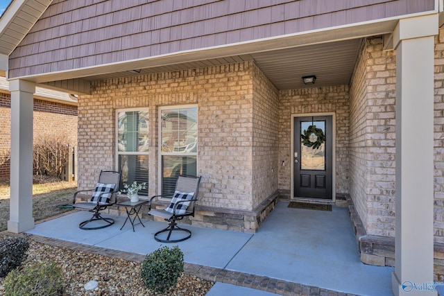 property entrance with a patio