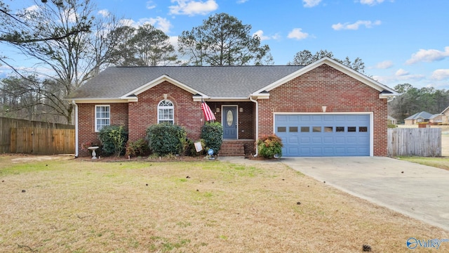 single story home featuring driveway, an attached garage, fence, and a front yard