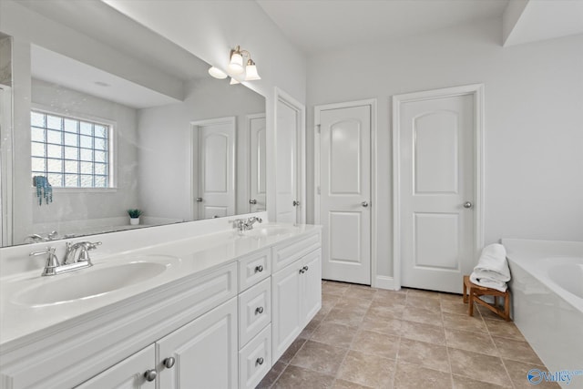 bathroom featuring vanity and a bathtub