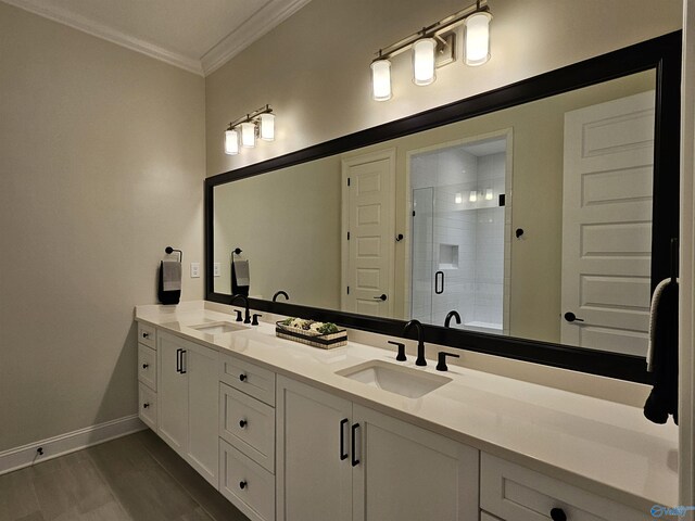 bathroom featuring walk in shower, hardwood / wood-style flooring, crown molding, and vanity