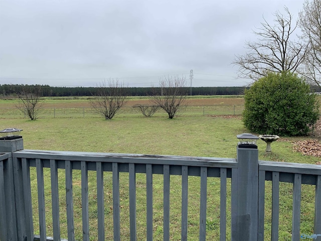 view of yard with a rural view