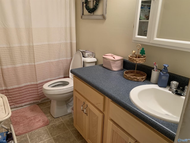 full bath with vanity and toilet