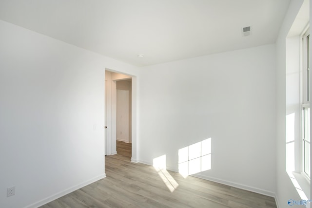 empty room with light wood-type flooring