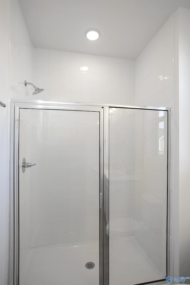 bathroom with an enclosed shower