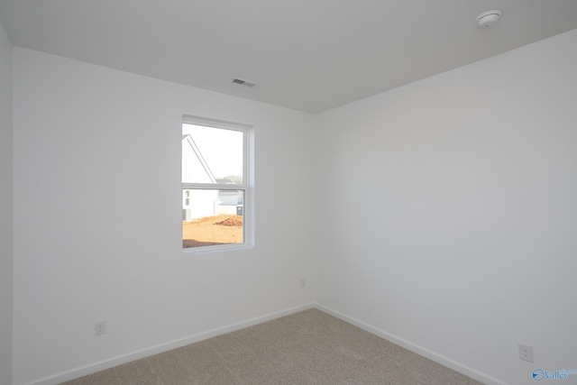 unfurnished room featuring carpet floors