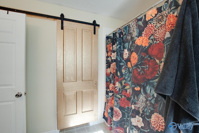 bathroom with tile patterned flooring