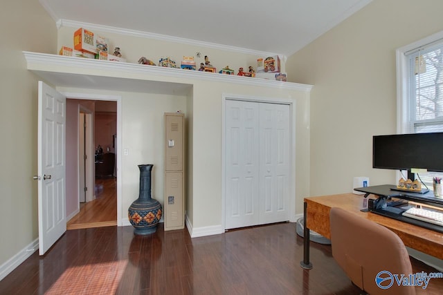 home office with dark hardwood / wood-style floors and ornamental molding