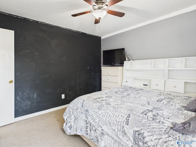 201 Turnbrook Dr SW, Huntsville, AL 35824 - carpeted bedroom with a ceiling fan and a textured ceiling
