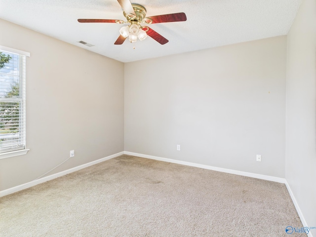201 Turnbrook Dr SW, Huntsville, AL 35824 - carpeted spare room with a ceiling fan and a textured ceiling