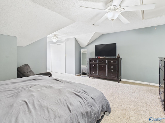 201 Turnbrook Dr SW, Huntsville, AL 35824 - bedroom featuring attic access, a textured ceiling, ceiling fan, vaulted ceiling, and carpet flooring