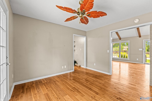 2009 SW Danbury Cir SW, Huntsville, AL 35803 - spare room with light wood-style floors, baseboards, ceiling fan, beamed ceiling, and a smoke detector