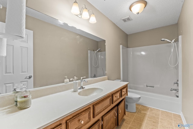 2009 SW Danbury Cir SW, Huntsville, AL 35803 - bathroom featuring vanity, bathtub / shower combination, toilet, and a textured ceiling