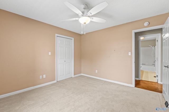 2009 SW Danbury Cir SW, Huntsville, AL 35803 - unfurnished bedroom with carpet flooring, baseboards, ceiling fan, and a closet