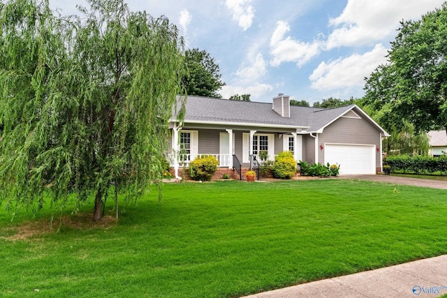 2009 SW Danbury Cir SW, Huntsville, AL 35803 - ranch-style home with covered porch, an attached garage, a chimney, driveway, and a front yard