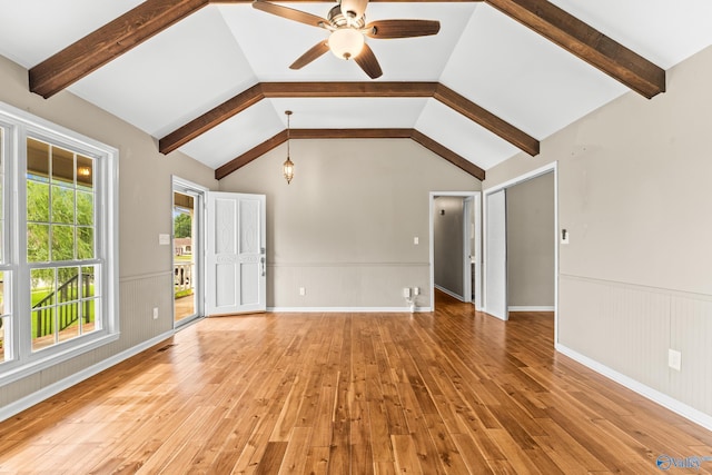 2009 SW Danbury Cir SW, Huntsville, AL 35803 - unfurnished living room featuring light wood-style flooring, a ceiling fan, and a wainscoted wall