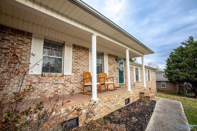 view of patio featuring a porch