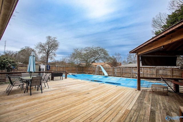 view of pool featuring a water slide