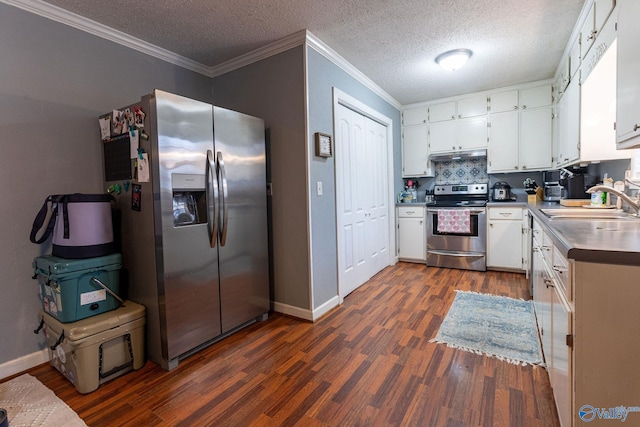 kitchen featuring white cabinetry, sink, dark wood-type flooring, and stainless steel appliances