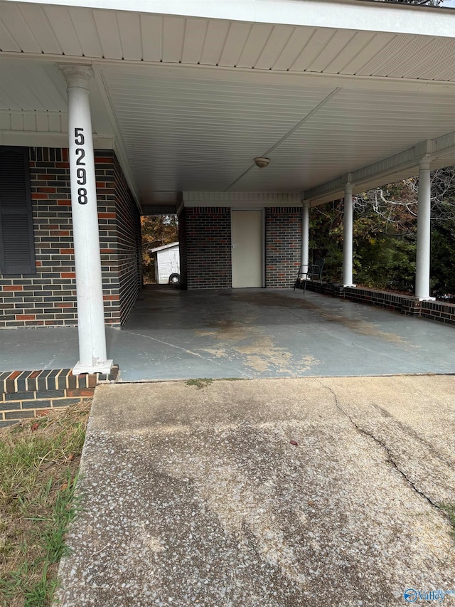 exterior space featuring a carport