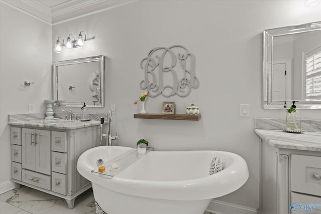 bathroom with vanity, a tub to relax in, and crown molding