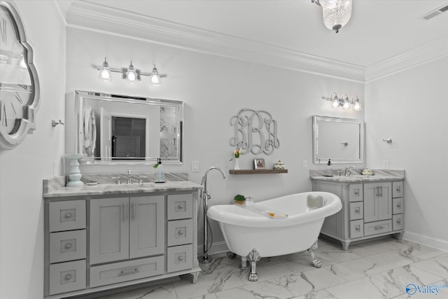 bathroom with ornamental molding, a bathing tub, and vanity