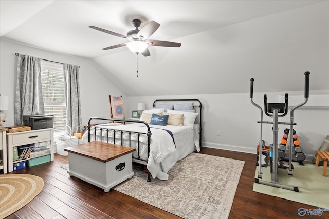 bedroom featuring lofted ceiling, dark wood-type flooring, and ceiling fan