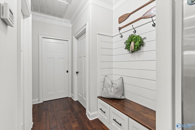 mudroom featuring crown molding and dark wood-type flooring