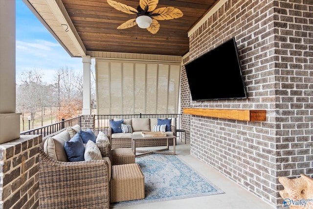 view of patio with a balcony, an outdoor hangout area, and ceiling fan