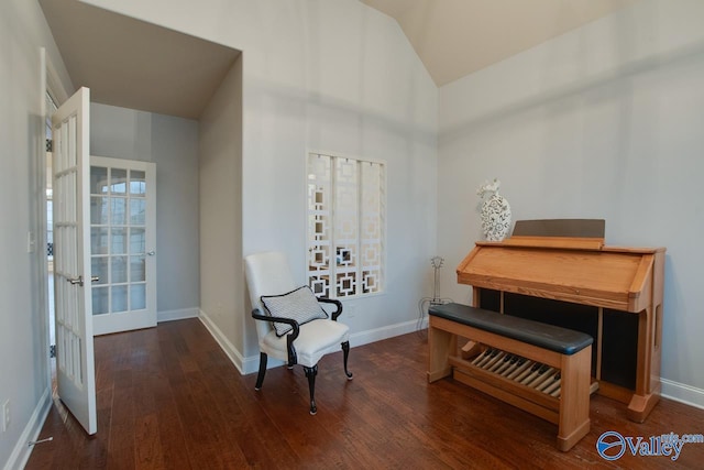 sitting room featuring french doors, dark hardwood / wood-style flooring, and plenty of natural light