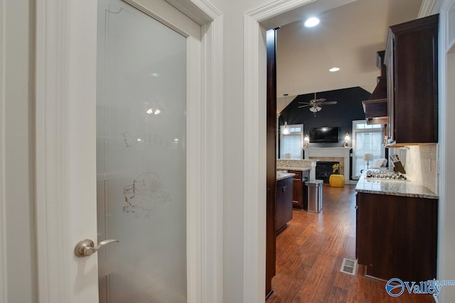 hall featuring dark wood-type flooring