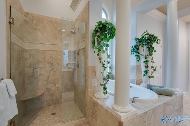 bathroom with decorative columns, crown molding, and shower with separate bathtub