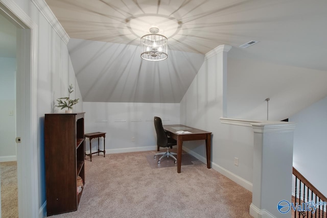 office area featuring light carpet, a chandelier, and vaulted ceiling