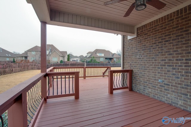 wooden deck with ceiling fan