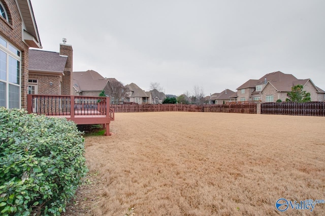 view of yard with a deck