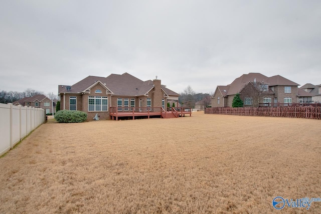 view of yard with a wooden deck