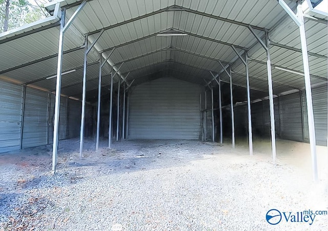 exterior space with a carport