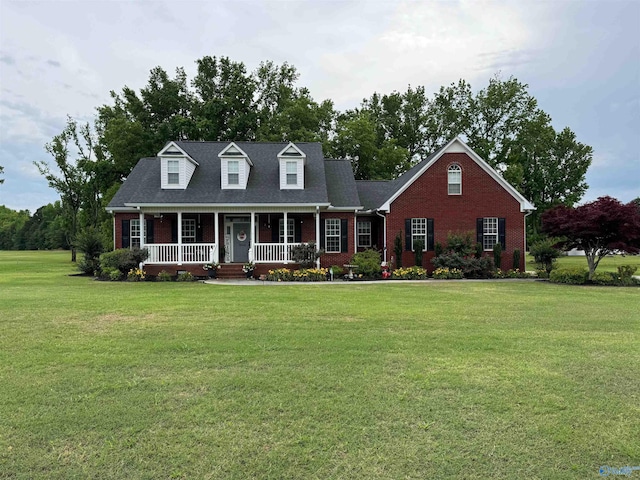 3648 Turnpike Rd, Albertville, AL 35950 - cape cod home featuring brick siding, covered porch, and a front yard