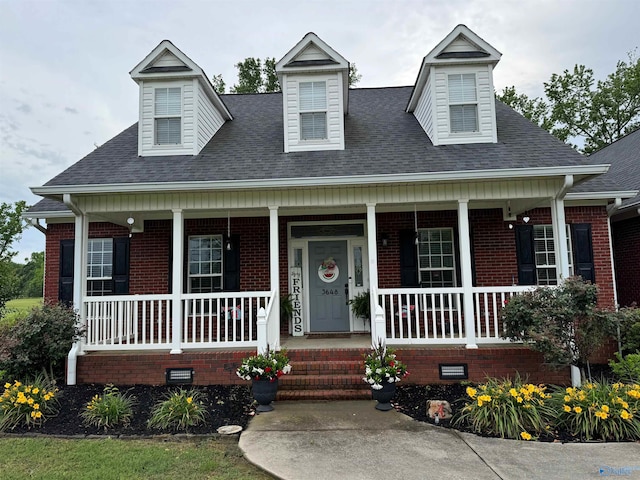 3648 Turnpike Rd, Albertville, AL 35950 - new england style home with a porch, crawl space, roof with shingles, and brick siding