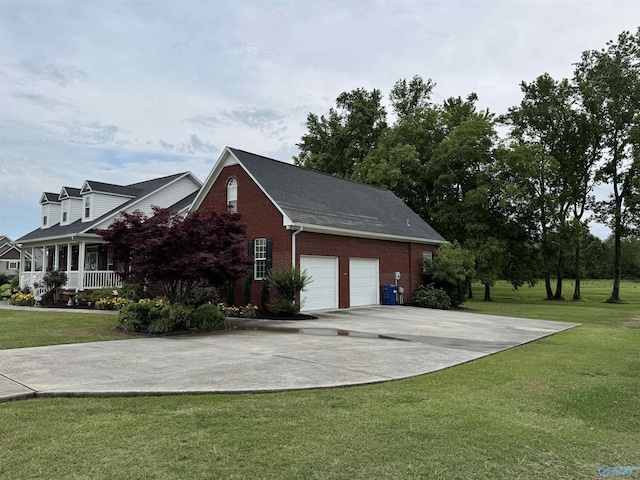 3648 Turnpike Rd, Albertville, AL 35950 - view of property exterior with brick siding, a yard, and driveway